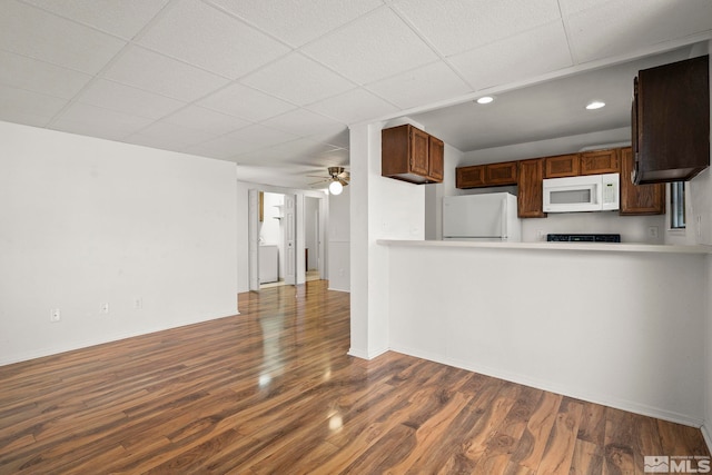 2193 Kietzke Ln Unit C, Reno, NV 89502 - kitchen with white appliances, dark wood-type flooring, recessed lighting, ceiling fan, and a drop ceiling