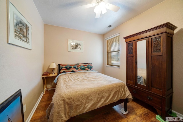 166 Oakridge Dr, Dayton, NV 89403 - bedroom with dark wood-type flooring, baseboards, and a ceiling fan