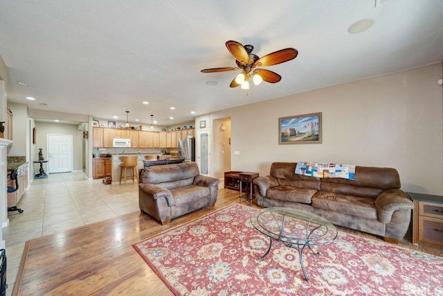 166 Oakridge Dr, Dayton, NV 89403 - living room with a ceiling fan, recessed lighting, and light wood-type flooring