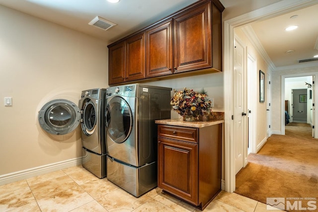 2143 The Back Rd, Glenbrook, NV 89413 - laundry room featuring baseboards, cabinet space, independent washer and dryer, crown molding, and light tile patterned floors