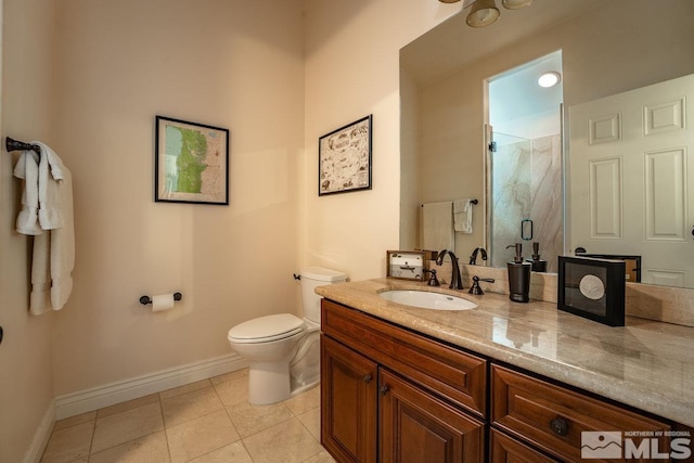 2143 The Back Rd, Glenbrook, NV 89413 - bathroom with baseboards, a stall shower, toilet, vanity, and tile patterned floors