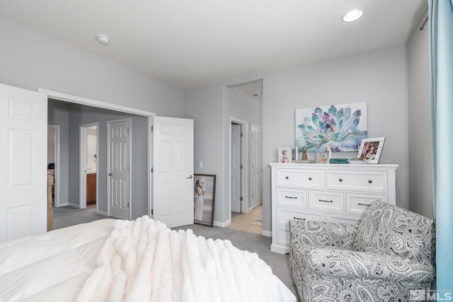 450 Ruffian Ct, Reno, NV 89521 - bedroom featuring light carpet, recessed lighting, baseboards, and light tile patterned floors
