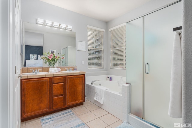450 Ruffian Ct, Reno, NV 89521 - full bathroom with tile patterned floors, a shower stall, a bath, and double vanity