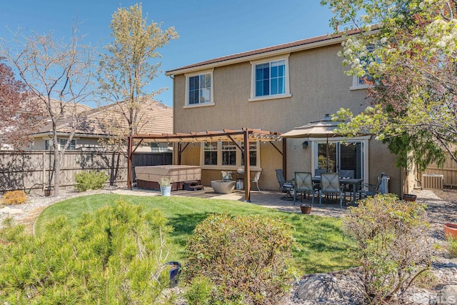 450 Ruffian Ct, Reno, NV 89521 - rear view of house featuring a hot tub, stucco siding, a pergola, a patio, and central AC unit