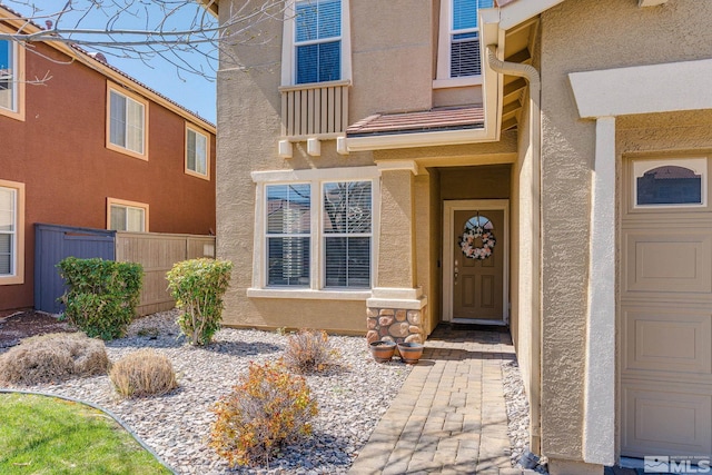450 Ruffian Ct, Reno, NV 89521 - entrance to property with stucco siding and fence