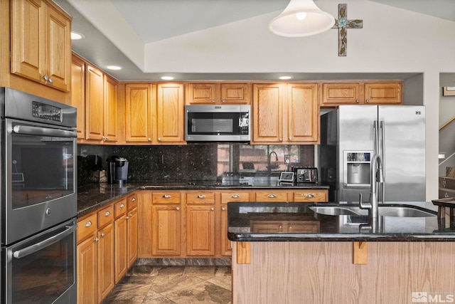 2116 Frisco Way, Sparks, NV 89434 - kitchen with appliances with stainless steel finishes, a sink, lofted ceiling, backsplash, and dark stone counters