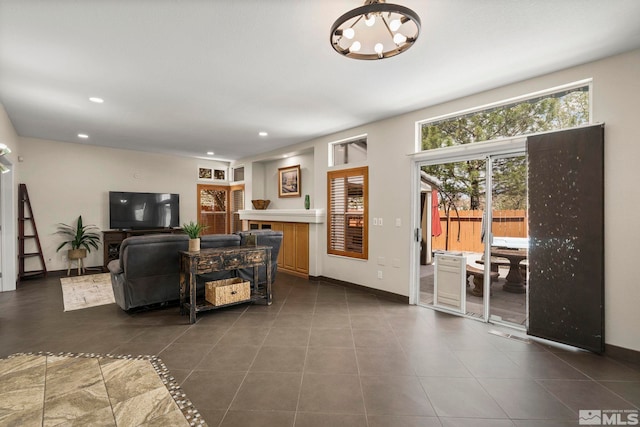 2116 Frisco Way, Sparks, NV 89434 - living room featuring a chandelier, dark tile patterned flooring, baseboards, and recessed lighting