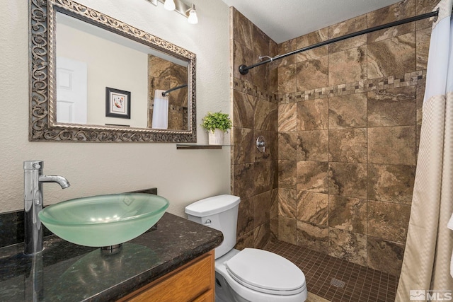 2116 Frisco Way, Sparks, NV 89434 - full bathroom featuring a tile shower, toilet, and vanity