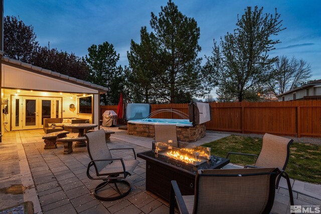 2116 Frisco Way, Sparks, NV 89434 - view of patio / terrace featuring a fire pit, french doors, and a fenced backyard