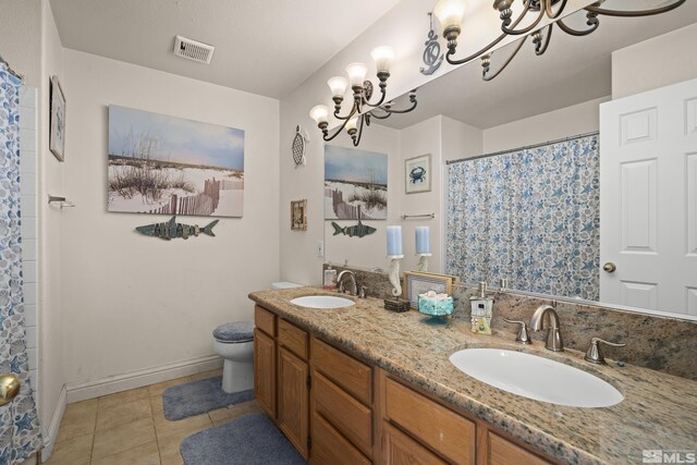 960 Country Ridge Dr, Sparks, NV 89434 - bathroom featuring a chandelier, toilet, tile patterned floors, double vanity, and a shower with curtain