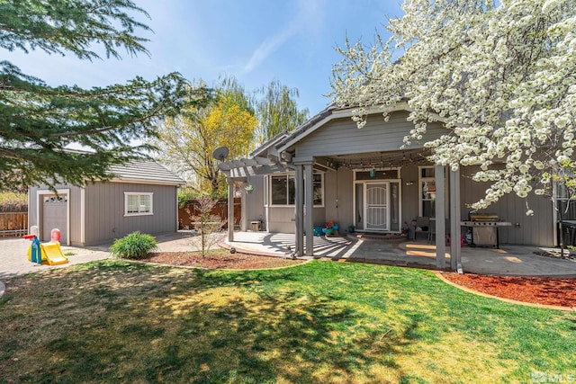 960 Country Ridge Dr, Sparks, NV 89434 - back of property with a pergola, a patio area, and an outdoor structure