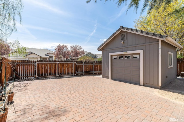 960 Country Ridge Dr, Sparks, NV 89434 - garage with fence and decorative driveway