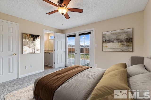 68 Zircon Dr, Reno, NV 89521 - carpeted bedroom featuring access to outside, baseboards, french doors, a textured ceiling, and a ceiling fan