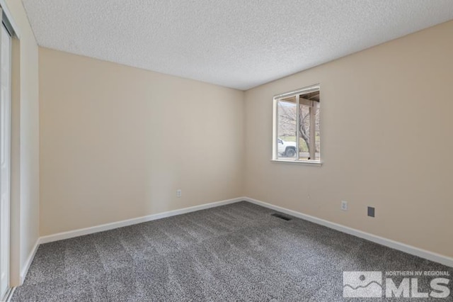 68 Zircon Dr, Reno, NV 89521 - spare room with carpet, a textured ceiling, and baseboards