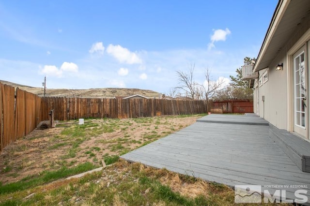 68 Zircon Dr, Reno, NV 89521 - fenced backyard featuring a deck