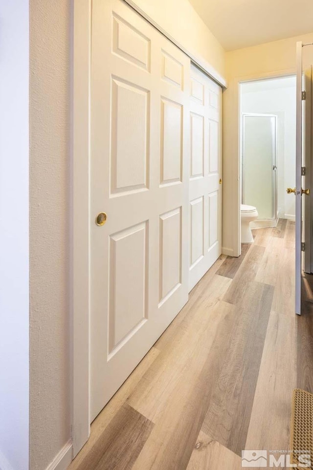2700 Plumas St Unit 300, Reno, NV 89509 - corridor with wood finished floors and baseboards