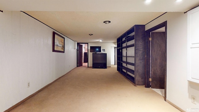 hallway with carpet and recessed lighting