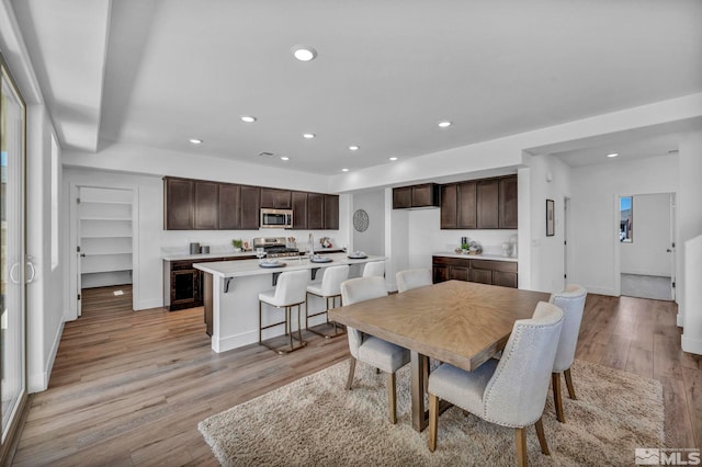 15 Nova Ct Unit 112, Carson City, NV 89705 - dining space with recessed lighting, light wood-style floors, baseboards, and built in features