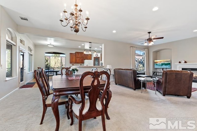 9900 Wilbur May Pkwy Unit 2704, Reno, NV 89521 - dining room featuring light carpet, healthy amount of natural light, recessed lighting, a chandelier, and a ceiling fan