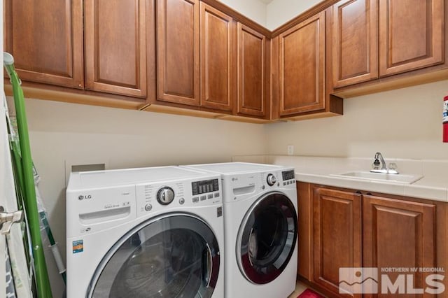 9900 Wilbur May Pkwy Unit 2704, Reno, NV 89521 - laundry area featuring separate washer and dryer and cabinet space