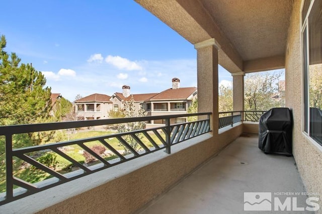 9900 Wilbur May Pkwy Unit 2704, Reno, NV 89521 - balcony featuring area for grilling and a residential view