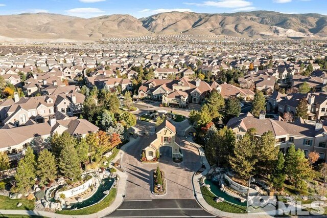 9900 Wilbur May Pkwy Unit 2704, Reno, NV 89521 - aerial view of property's location with nearby suburban area and mountains
