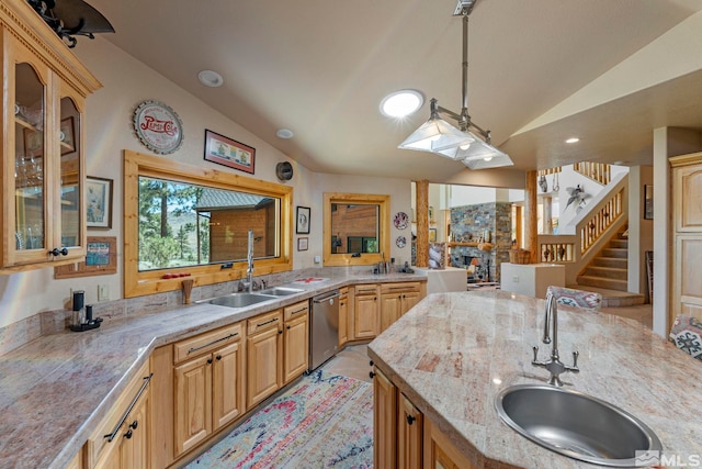 180 Nottingham Ct, Reno, NV 89511 - kitchen with lofted ceiling, a sink, stainless steel dishwasher, glass insert cabinets, and light stone counters