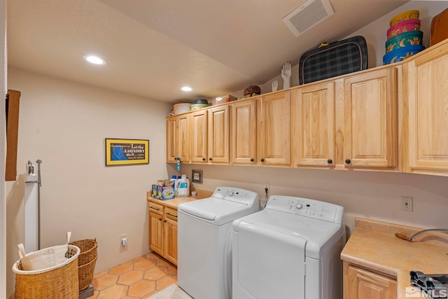 180 Nottingham Ct, Reno, NV 89511 - laundry area with cabinet space, independent washer and dryer, recessed lighting, and light tile patterned floors