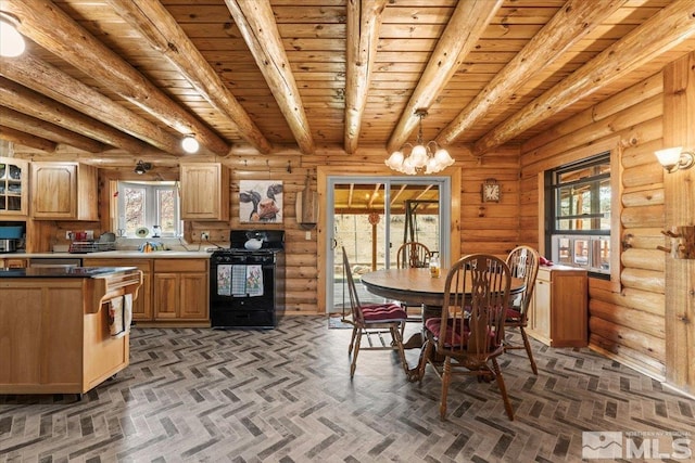 8705 Spearhead Way, Reno, NV 89506 - dining space featuring a chandelier, rustic walls, plenty of natural light, wooden ceiling, and beam ceiling
