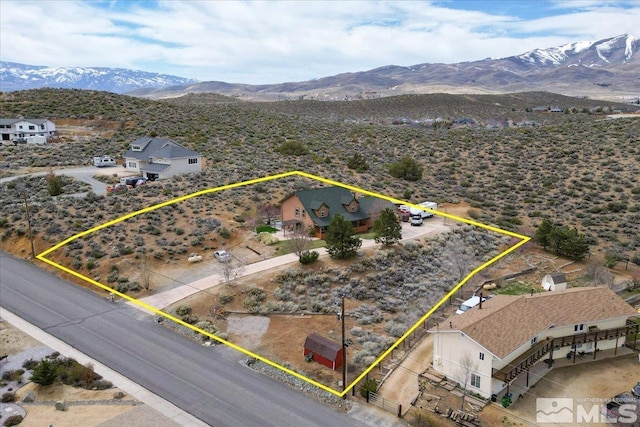 8705 Spearhead Way, Reno, NV 89506 - aerial overview of property's location featuring property parcel outlined and a mountainous background