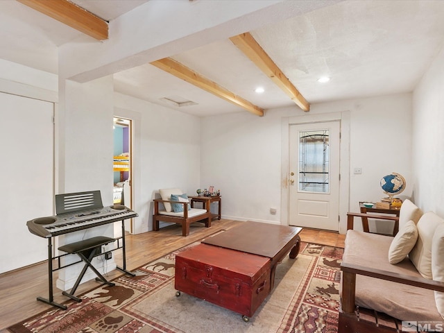 325 Stock Ln, Fernley, NV 89408 - living room with beamed ceiling, light wood-style flooring, and recessed lighting