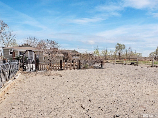 325 Stock Ln, Fernley, NV 89408 - fenced yard featuring a gate