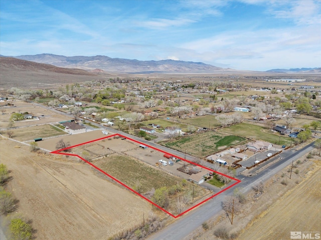 325 Stock Ln, Fernley, NV 89408 - aerial view of property and surrounding area with mountains and property parcel outlined