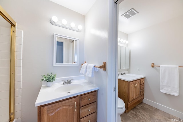2271 Oppio St, Sparks, NV 89431 - full bath with two vanities, toilet, baseboards, and a shower
