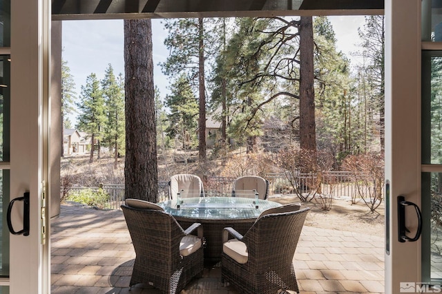 6554 Champetre, Reno, NV 89511 - view of patio / terrace featuring outdoor dining area and fence