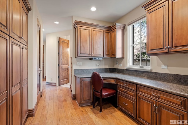 6554 Champetre, Reno, NV 89511 - office space featuring built in desk, light wood-type flooring, baseboards, and recessed lighting