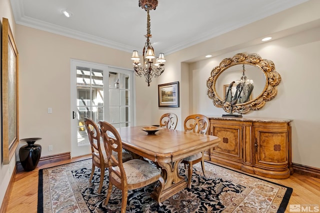 6554 Champetre, Reno, NV 89511 - dining area with a chandelier, ornamental molding, light wood finished floors, baseboards, and recessed lighting