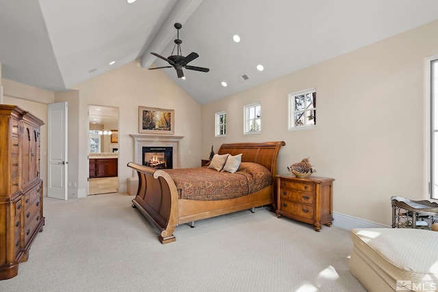6554 Champetre, Reno, NV 89511 - bedroom featuring light carpet, beamed ceiling, a glass covered fireplace, baseboards, and ensuite bathroom