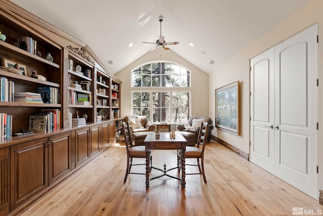 6554 Champetre, Reno, NV 89511 - dining room featuring ceiling fan, light wood-type flooring, high vaulted ceiling, and an office area