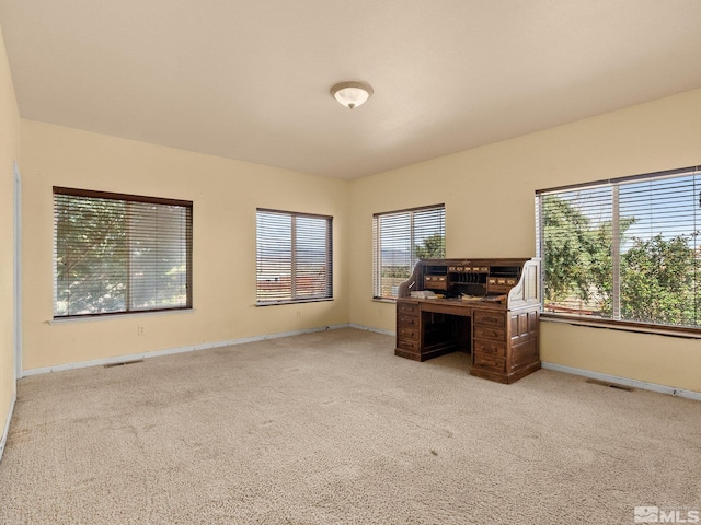 1974 Spring Rd, Fernley, NV 89408 - unfurnished office featuring carpet floors and baseboards