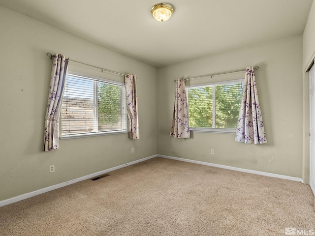 1974 Spring Rd, Fernley, NV 89408 - carpeted spare room featuring plenty of natural light and baseboards