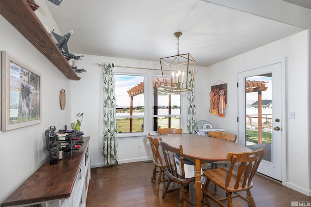 1675 Skyridge Dr, Fallon, NV 89406 - dining room featuring dark wood-style floors, a chandelier, and baseboards