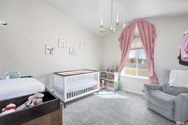 1675 Skyridge Dr, Fallon, NV 89406 - bedroom with a chandelier, carpet, vaulted ceiling, a crib, and baseboards