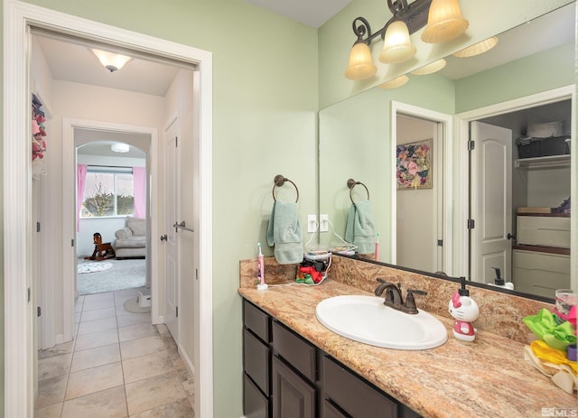1675 Skyridge Dr, Fallon, NV 89406 - bathroom featuring vanity, tile patterned flooring, and baseboards