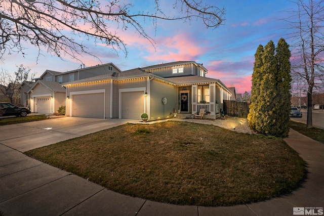 view of front of house with an attached garage and driveway