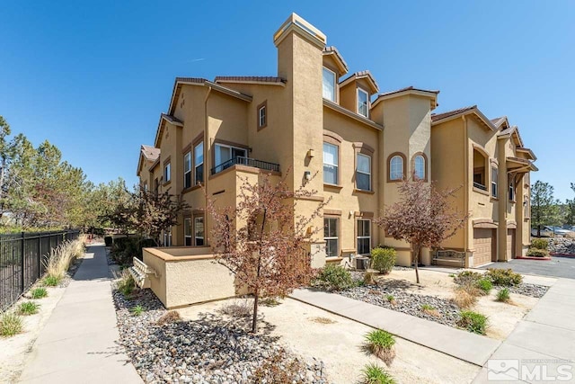 17000 Wedge Pkwy Unit 111, Reno, NV 89511 - view of property with fence