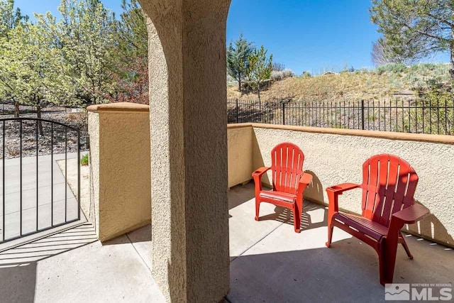 17000 Wedge Pkwy Unit 111, Reno, NV 89511 - view of patio featuring fence