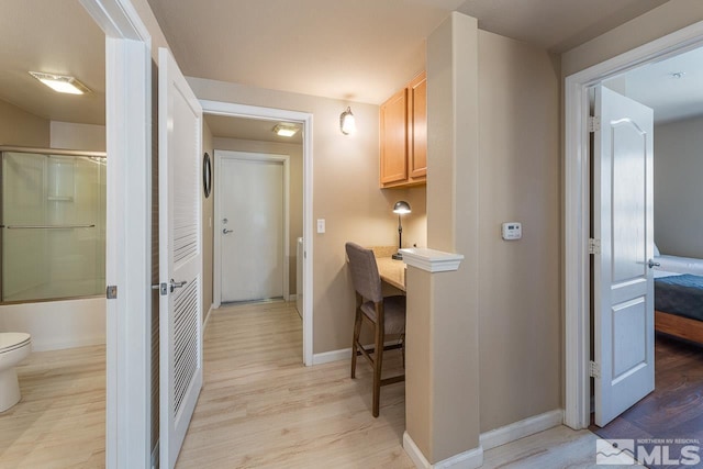 17000 Wedge Pkwy Unit 111, Reno, NV 89511 - hall with light wood finished floors and baseboards