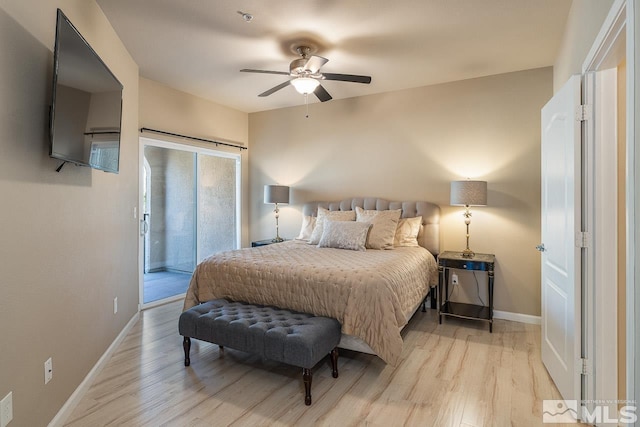 17000 Wedge Pkwy Unit 111, Reno, NV 89511 - bedroom featuring access to outside, light wood finished floors, baseboards, and ceiling fan