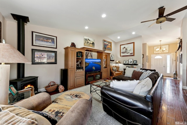 1367 Porter Dr, Minden, NV 89423 - living area with a wood stove, a chandelier, a ceiling fan, recessed lighting, and vaulted ceiling